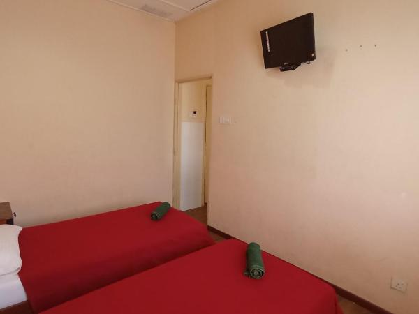 Straits Settlement Inn : photo 2 de la chambre chambre lits jumeaux standard