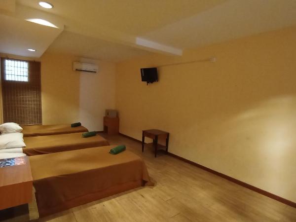 Straits Settlement Inn : photo 2 de la chambre chambre triple deluxe
