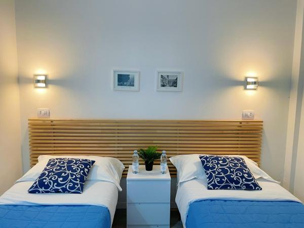 Residenza Borgo Trento SUNDAY : photo 1 de la chambre chambre double avec salle de bains privative extérieure