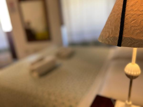 L'Antica Torre Caralis Holiday : photo 1 de la chambre grande chambre double ou lits jumeaux