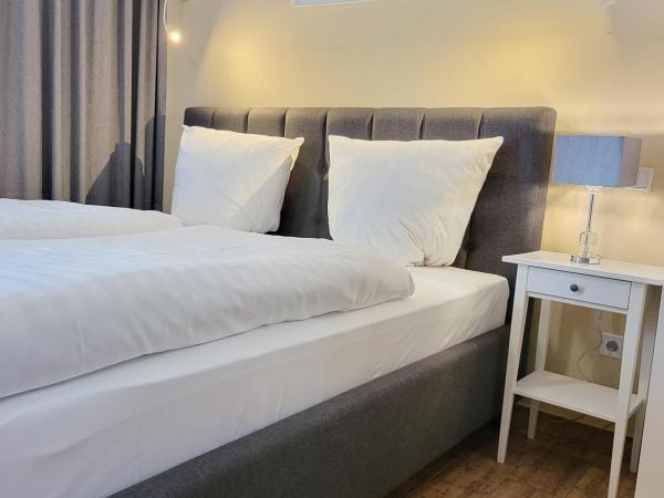 Marcel Apartments Leipzig : photo 1 de la chambre appartement avec balcon