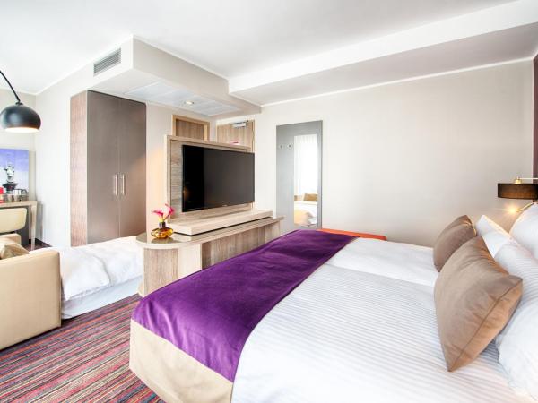 Leonardo Hotel Munich City South : photo 4 de la chambre chambre triple supérieure