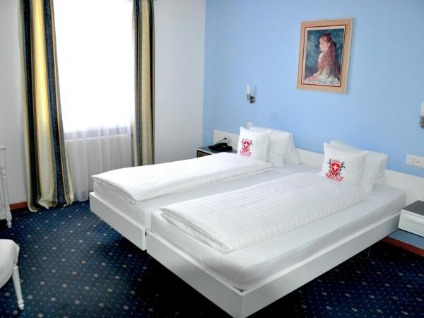 Hotel Weisses Kreuz : photo 5 de la chambre chambre lits jumeaux