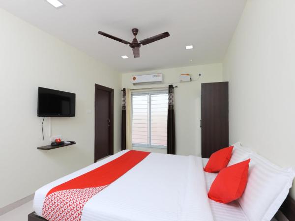 Super OYO Flagship Perfect Stay Near Meenambakkam Metro Station : photo 7 de la chambre chambre double ou lits jumeaux standard