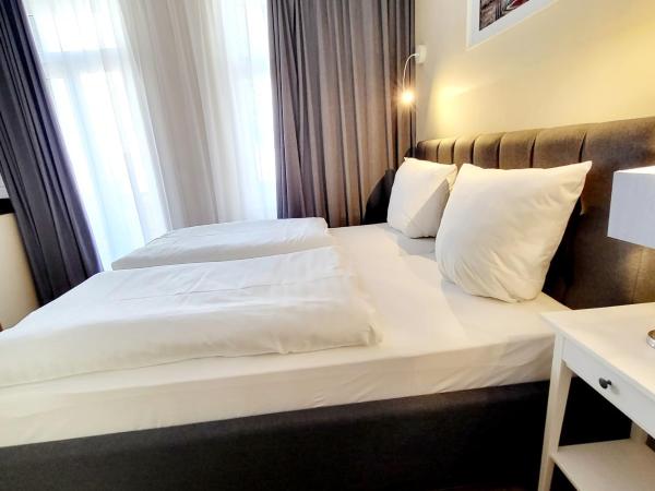 Marcel Apartments Leipzig : photo 3 de la chambre appartement avec balcon