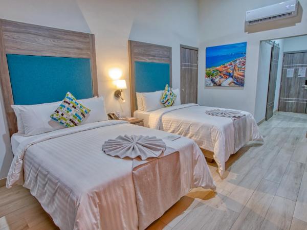 Casa Nicole Boutique Hotel : photo 2 de la chambre chambre quadruple avec salle de bains privative