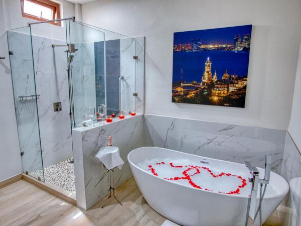 Casa Nicole Boutique Hotel : photo 3 de la chambre chambre lit king-size avec baignoire spa