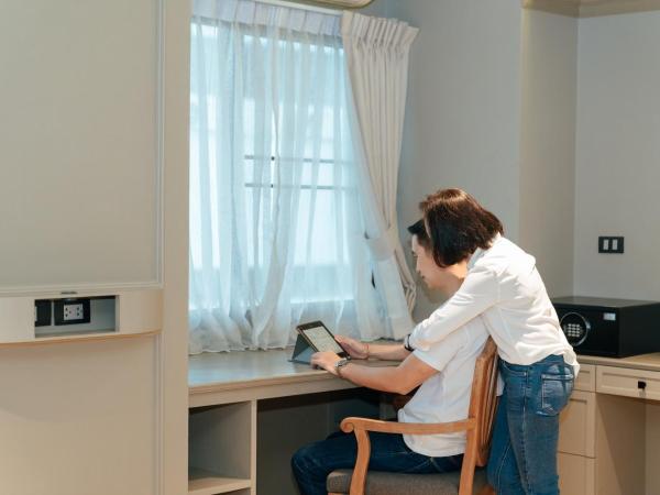 THEA Serviced Apartment by TH District : photo 9 de la chambre suite exécutive