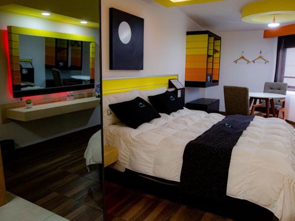 Hotel Contadero Suites y Villas : photo 2 de la chambre chambre lit king-size