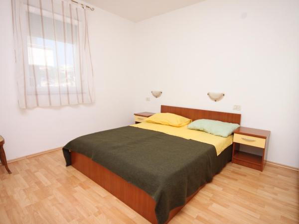 Apartments and rooms with parking space Novalja, Pag - 6341 : photo 3 de la chambre appartement 2 chambres avec terrasse et vue sur la mer