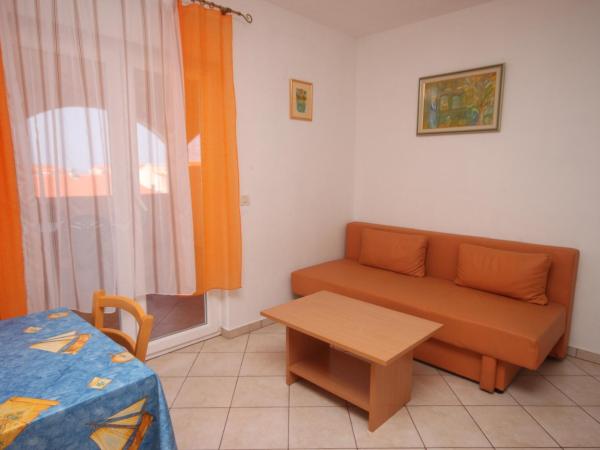 Apartments and rooms with parking space Novalja, Pag - 6341 : photo 1 de la chambre appartement 1 chambre avec terrasse - vue sur mer