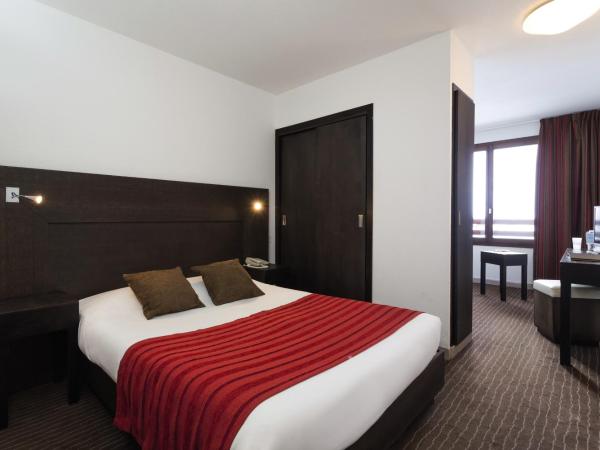 Hôtel Tignes Le Diva : photo 1 de la chambre chambre triple