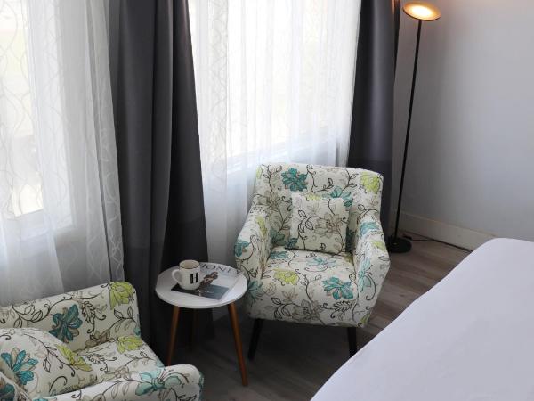 Hometel Suites : photo 2 de la chambre suite deluxe avec lit king-size