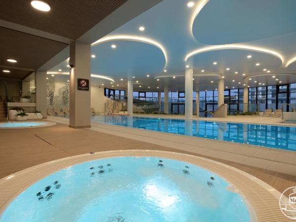 Polanki Aqua - Aquapark, Free Parking, Apartments M&M Kołobrzeg : photo 8 de la chambre appartement avec balcon