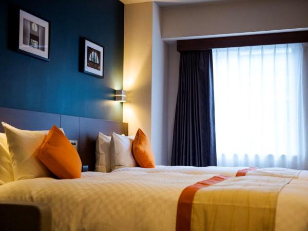 Best Western Plus Fukuoka Tenjin-minami : photo 3 de la chambre quadruple room with four single beds