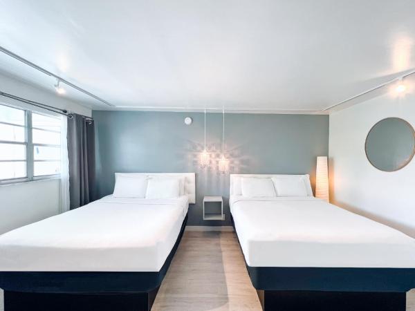 North Beach Hotel : photo 1 de la chambre studio avec 2 lits queen-size