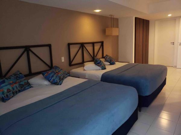 Vila do Mar Natal - All Inclusive : photo 8 de la chambre suite lit queen-size avec baignoire spa