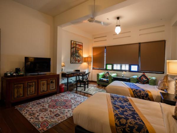 Hotel Penaga : photo 9 de la chambre chambre lits jumeaux hutton deluxe avec jacuzzi