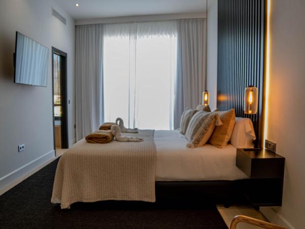 Casa Bodhi Boutique Hotel & Spa : photo 1 de la chambre chambre lit king-size - vue sur jardin