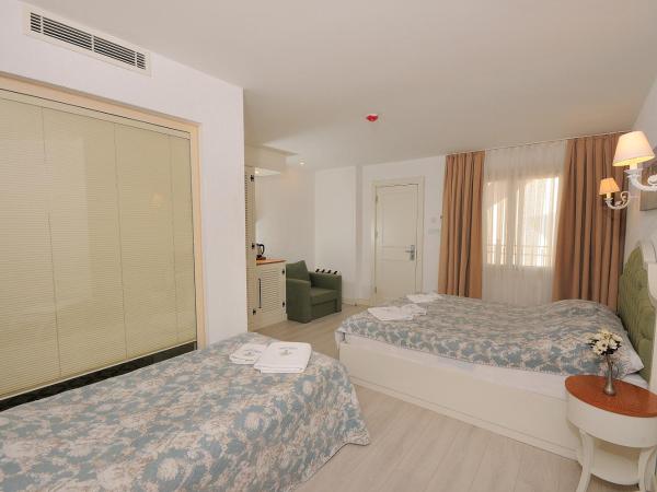 GİRİTLİM BUTİK OTEL : photo 3 de la chambre chambre familiale