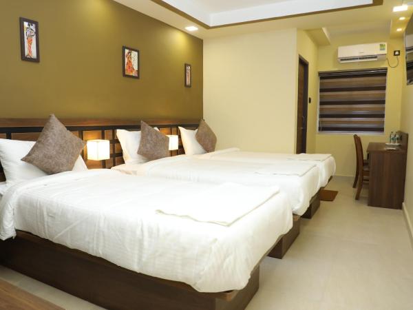 KANS ONE - Madipakkam : photo 1 de la chambre chambre triple