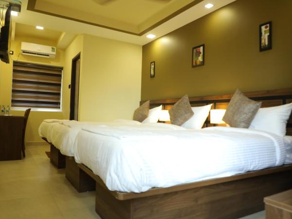 KANS ONE - Madipakkam : photo 4 de la chambre chambre triple