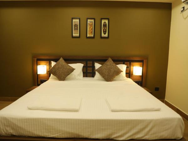 KANS ONE - Madipakkam : photo 3 de la chambre chambre lit king-size