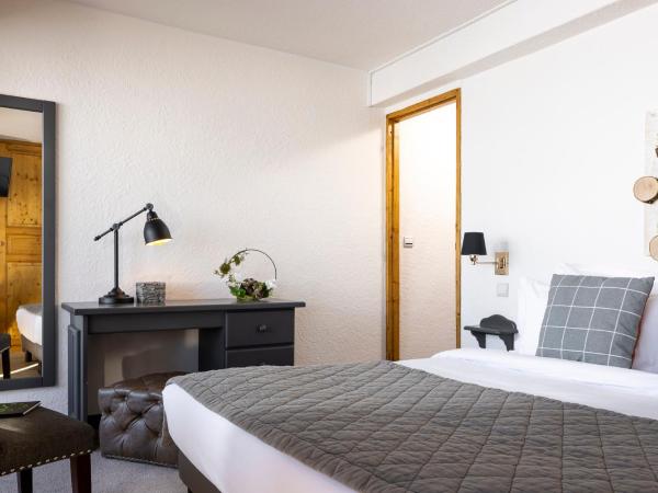 Hôtel Courcheneige : photo 3 de la chambre chambre familiale