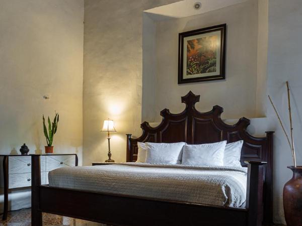 VILLA MERIDA BOUTIQUE HOTEL - Adults Only : photo 4 de la chambre chambre double - vue sur jardin