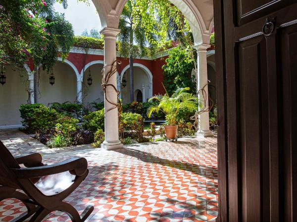 VILLA MERIDA BOUTIQUE HOTEL - Adults Only : photo 5 de la chambre chambre lit queen-size - vue sur jardin