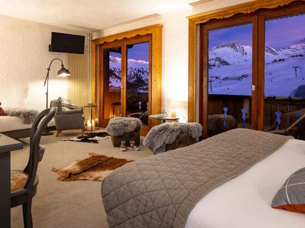Hôtel Courcheneige : photo 1 de la chambre suite junior avec balcon