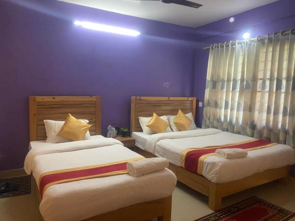 Thanapati Guesthouse : photo 3 de la chambre chambre triple deluxe