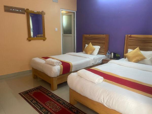 Thanapati Guesthouse : photo 2 de la chambre chambre triple deluxe