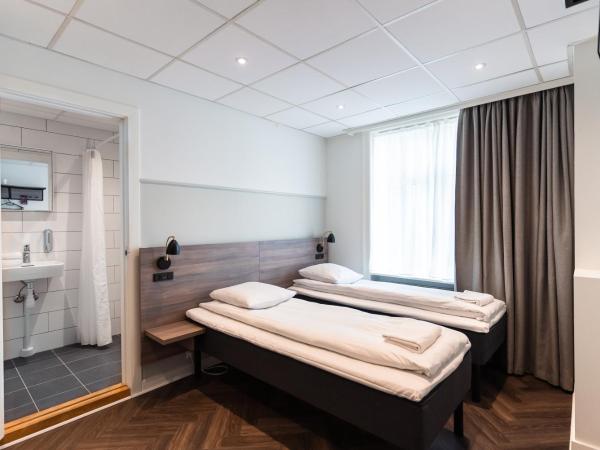 Go Hotel Saga : photo 2 de la chambre chambre lits jumeaux standard avec salle de bains privative

