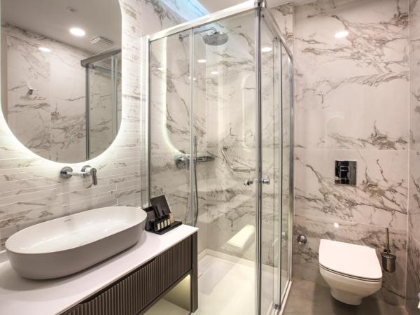 Unique Life Style Hotel : photo 3 de la chambre chambre double ou lits jumeaux - vue sur mer