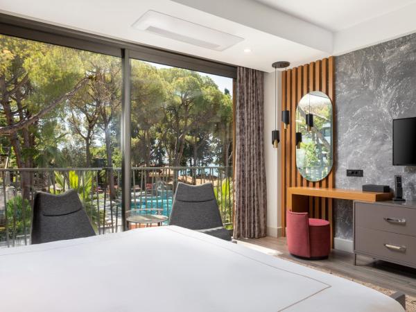 Unique Life Style Hotel : photo 2 de la chambre chambre triple - vue sur jardin