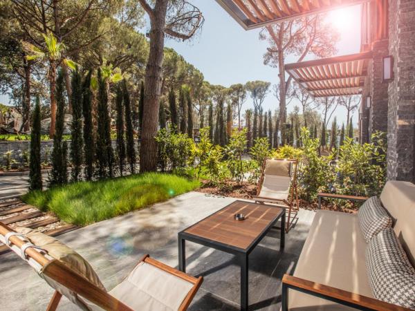 Unique Life Style Hotel : photo 4 de la chambre chambre triple avec terrasse