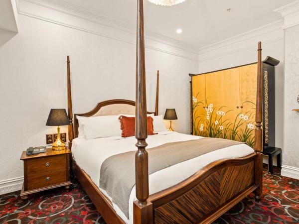 The Terrace Hotel : photo 1 de la chambre suite deluxe avec lit king-size