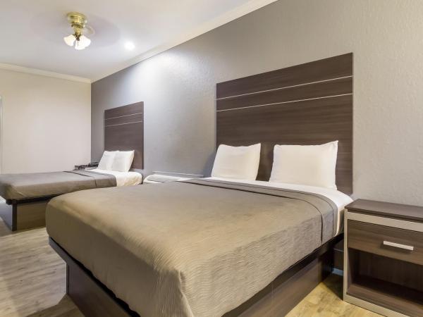 Americas Best Value Platinum Inn & Suites : photo 3 de la chambre hébergement avec 2 lits queen-size