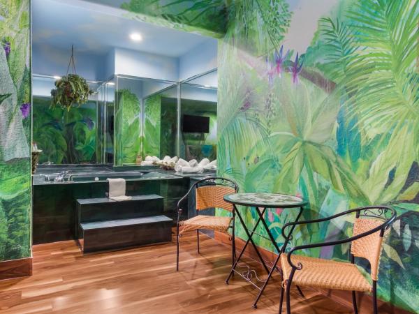 Americas Best Value Platinum Inn & Suites : photo 4 de la chambre hébergement 1 lit king-size avec jacuzzi