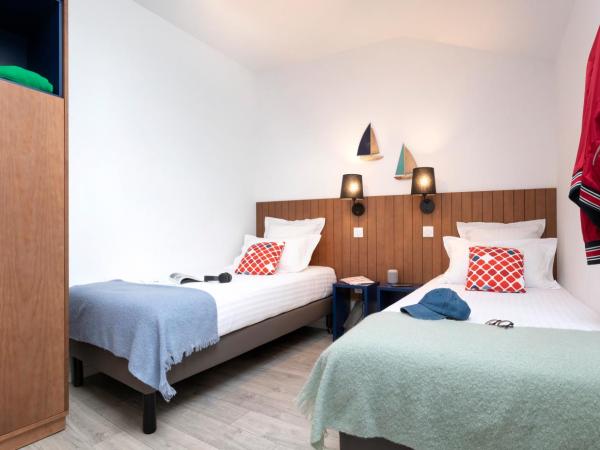 Pierre & Vacances Premium Les Villas d'Olonne : photo 8 de la chambre maison 4 chambres en duplex avec piscine privée (8 personnes)