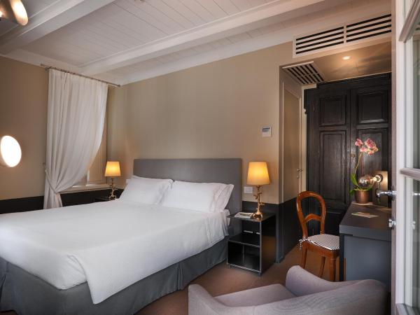 Maison Borella : photo 4 de la chambre chambre double ou lits jumeaux - vue sur cour