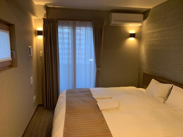 C＆Jホテル : photo 6 de la chambre chambre lit king-size