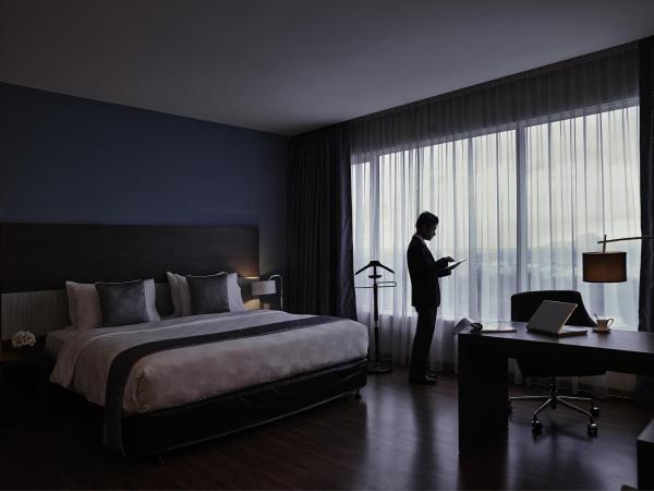 Pullman Kuching : photo 4 de la chambre chambre lit king-size exécutive