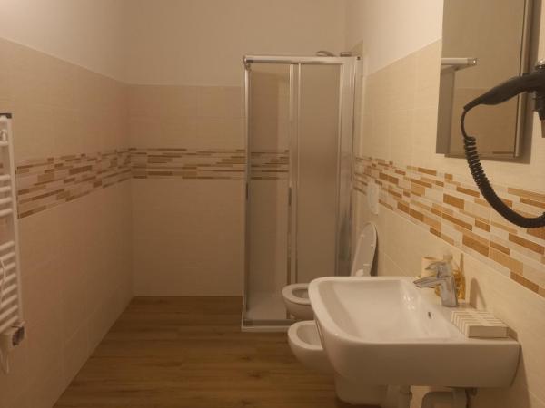 Gardafarm agriturismo : photo 2 de la chambre chambre deluxe (2 adultes + 1 enfant)