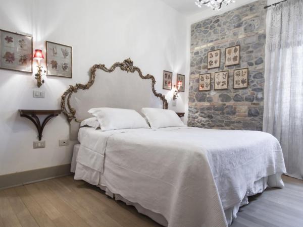 Villino di Porporano : photo 4 de la chambre chambre lit king-size deluxe