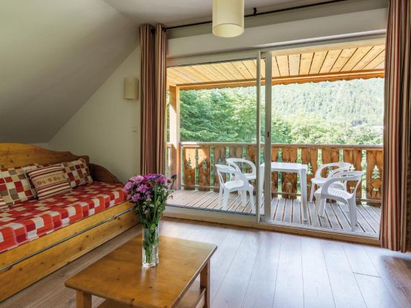 Lagrange Vacances Le Domaine des 100 Lacs : photo 4 de la chambre studio avec alcôve (4 adultes)

