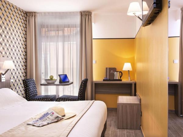 Unique Hôtel Résidence & Spa : photo 1 de la chambre chambre triple