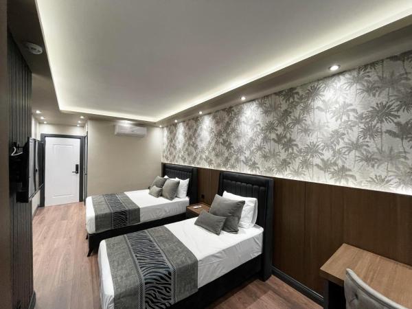 GRAND ÜSKÜDAR OTEL : photo 1 de la chambre chambre deluxe double ou lits jumeaux