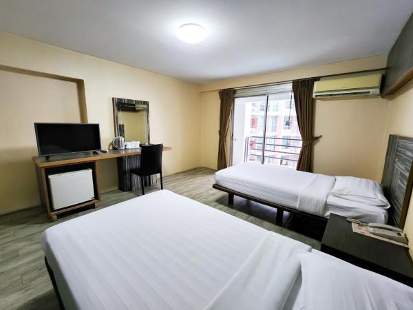 Watana Hotel : photo 7 de la chambre chambre lits jumeaux deluxe